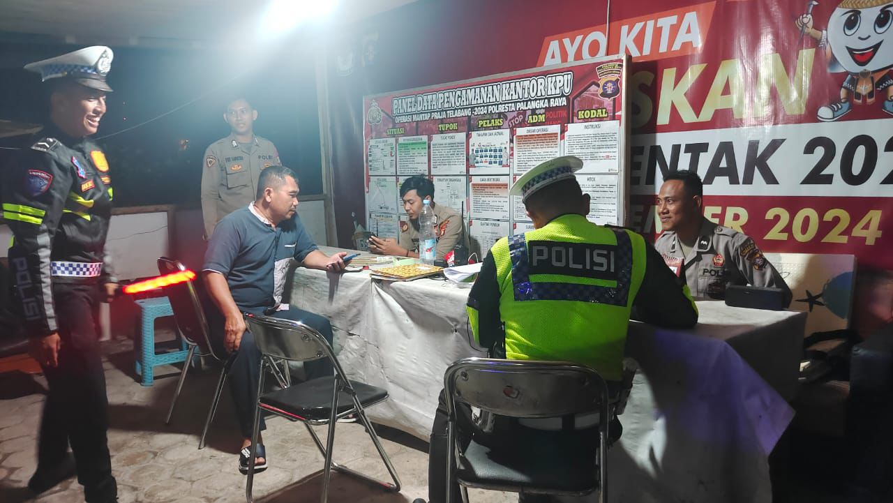 Anggota Satlantas Polresta Palangka Raya Tinjau Kondusivitas dan Datangi Kantor KPU