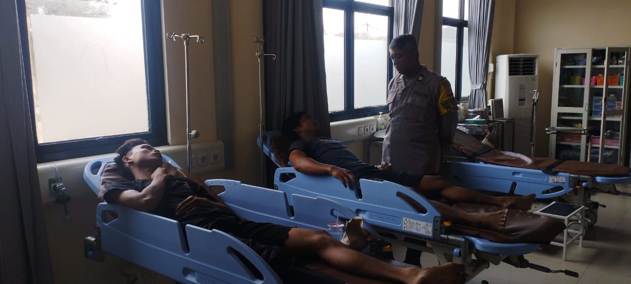 Piket SPKT Polsek Sabangau Tindaklanjuti Laporan Kecelakaan Lalu Lintas di Jalan Mahir Mahar
