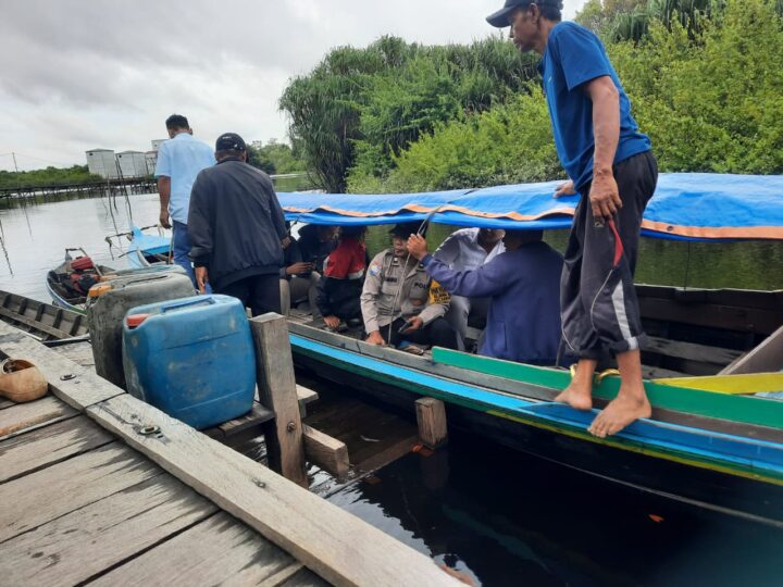 Bhabinkamtibmas Polsek Sabangau Dampingi Tim Survey Persiapan Dapur MBG di Danau Tundai