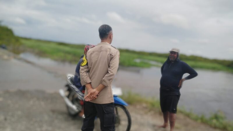 Bhabinkamtibmas Polsek Sabangau Imbau Warga Bereng Bengkel Waspada Kenaikan Debit Air