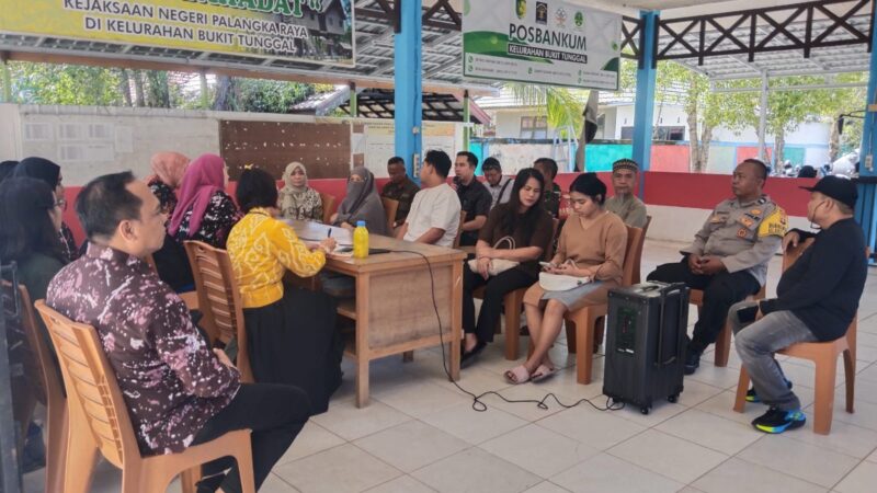 Bhabinkamtibmas Bukit Tunggal Hadiri Rapat Penanganan Warga Kurang Mampu yang Membutuhkan Perawatan Kesehatan
