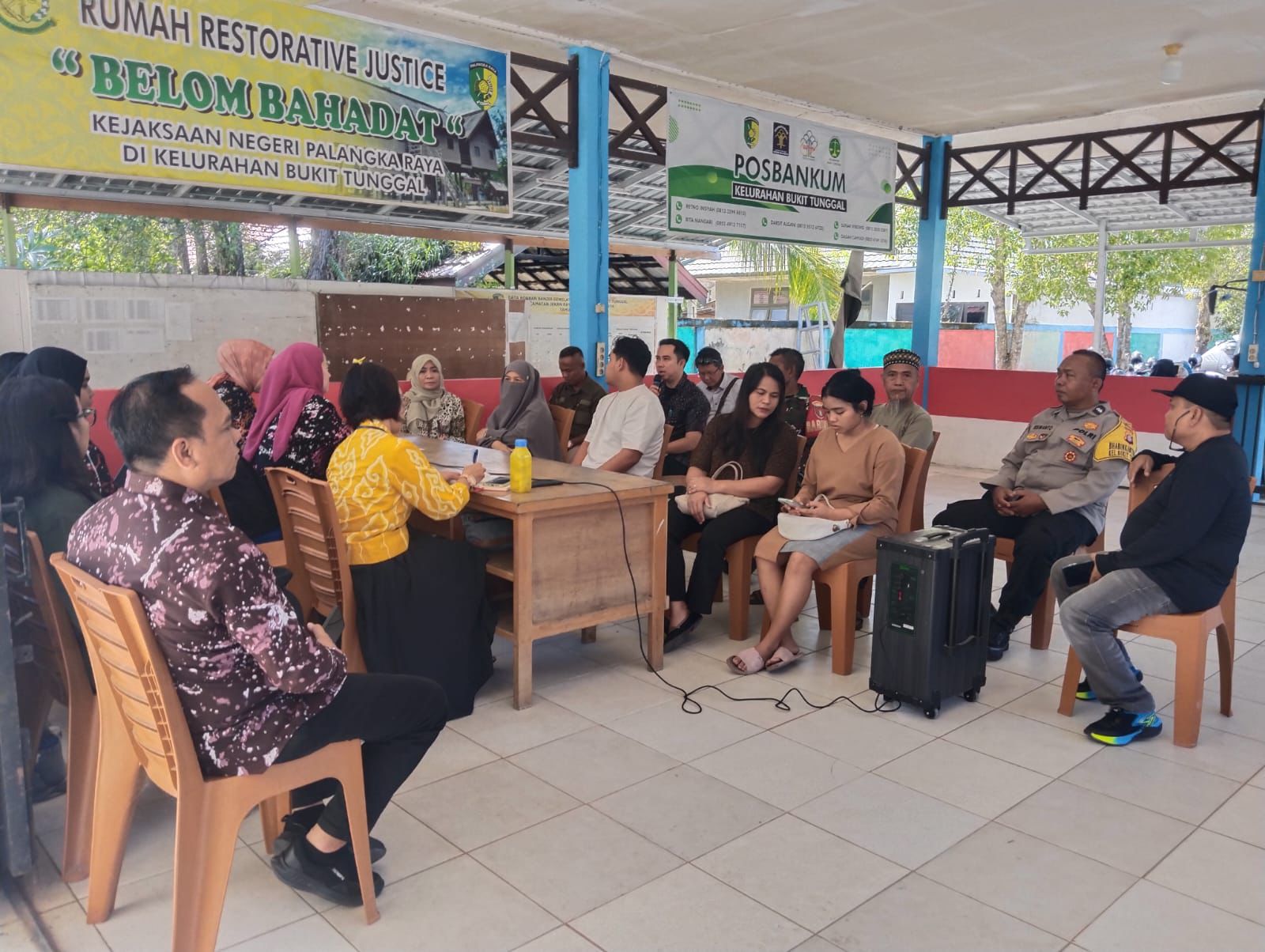 Bhabinkamtibmas Bukit Tunggal Hadiri Rapat Penanganan Warga Kurang Mampu yang Membutuhkan Perawatan Kesehatan