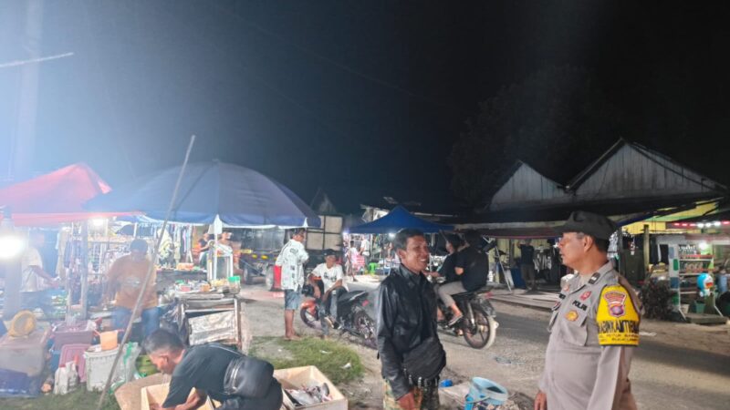 Rangkul Pedagang di Pasar Rakyat Takaras, Polsek Rakumpit Sosialisasikan Layanan Polri 110