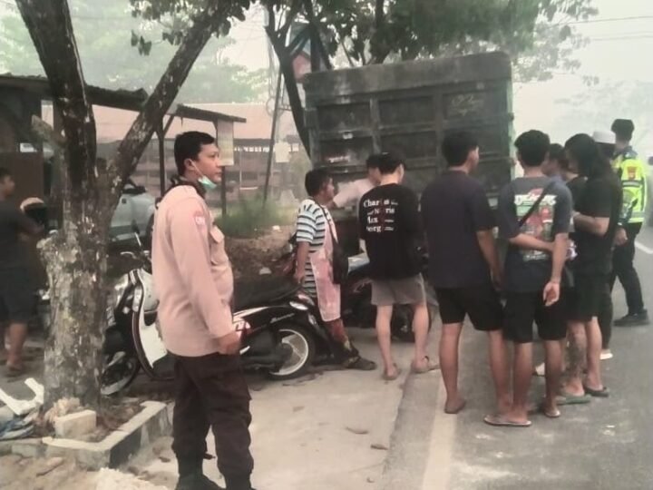 Terima Laporam Lakalantas, Bhabinkamtibmas Langkai Amankan Kendaraan di Lokasi