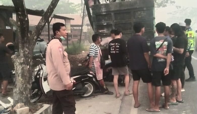 Terima Laporam Lakalantas, Bhabinkamtibmas Langkai Amankan Kendaraan di Lokasi