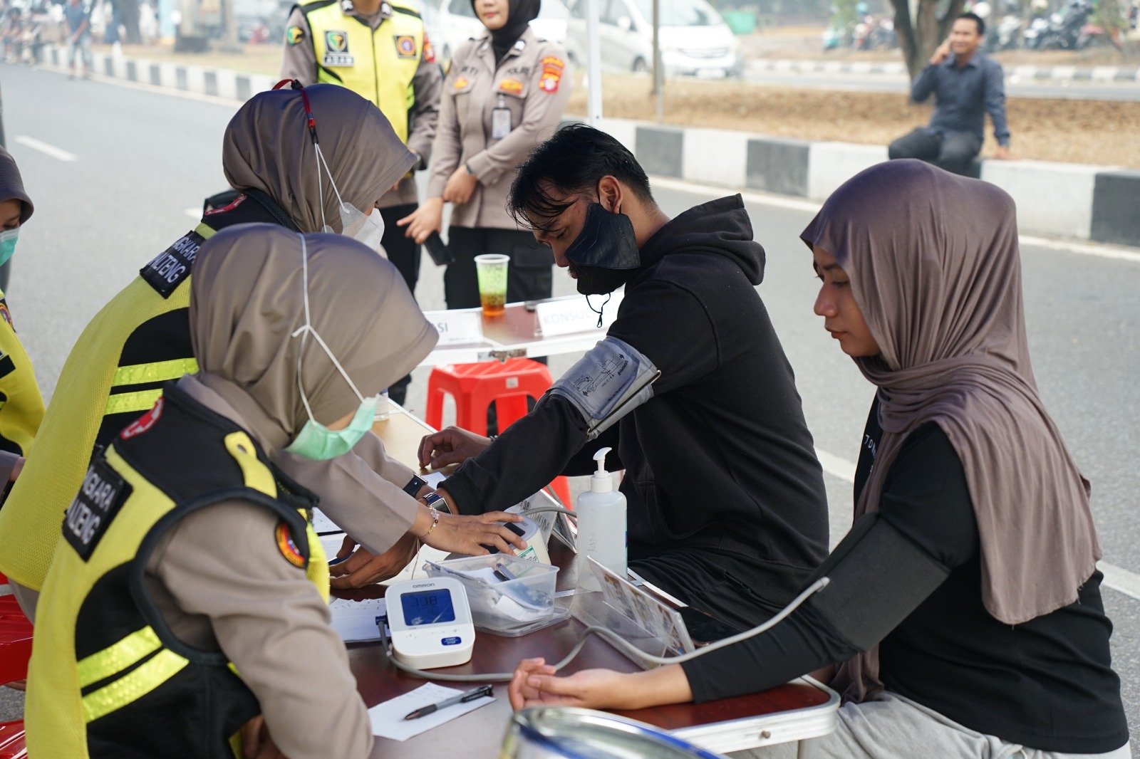 Peduli Kesehatan Masyarakat Terdampak Asap Karhutla, Rumkit Bhayangkara Berikan Layanan Kesehatan Gratis di CFD