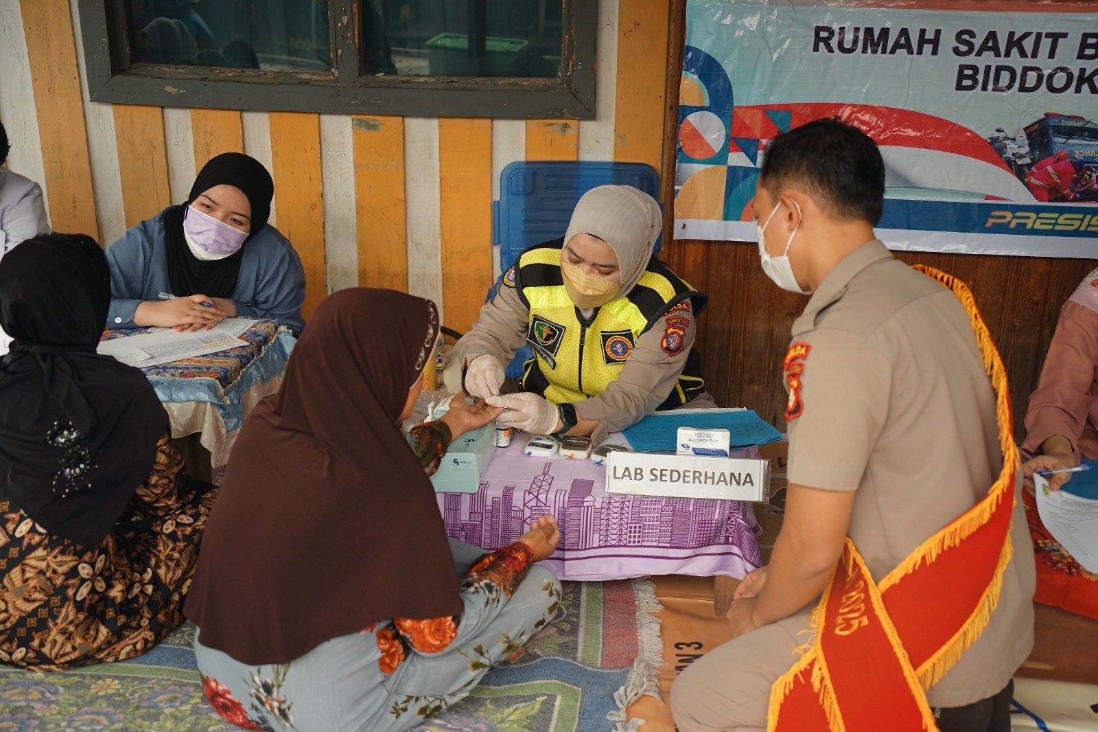 Posyandu Keliling Rutin, Wujud Komitmen Rumkit Bhayangkara Tingkatkan Derajat Kesehatan Masyarakat